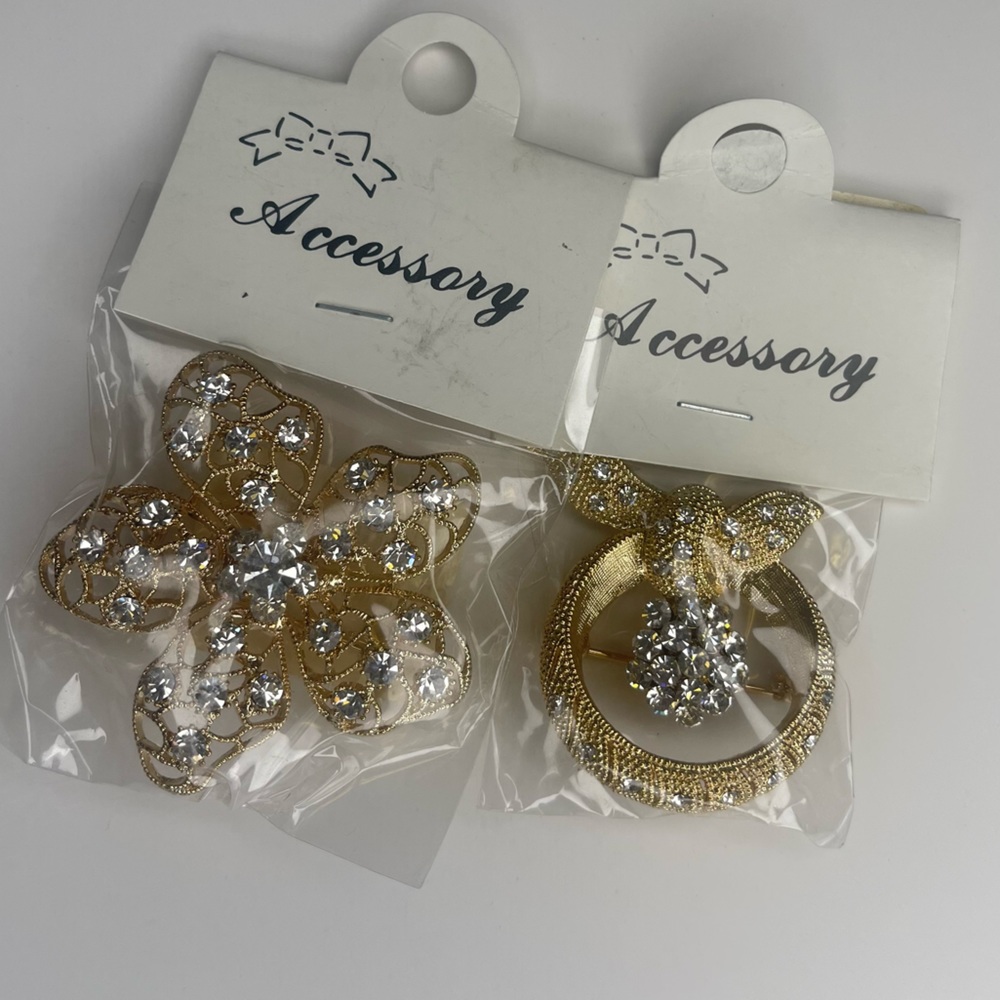 Gold & silver brooches/pin
